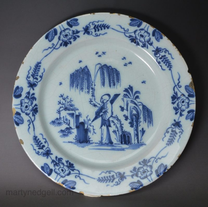 London delft plate decorated with a Chinese sage, circa 1760