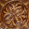 Early Staffordshire slipware dish decorated with a geometric design, circa 1670 - 1700