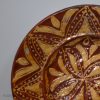 Early Staffordshire slipware dish decorated with a geometric design, circa 1670 - 1700