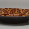 Early Staffordshire slipware dish decorated with a geometric design, circa 1670 - 1700