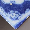 Liverpool delft tile decorated with angel head corners and floral arrangement, circa 1750