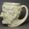 Creamware pottery Satyr mug, circa 1780