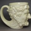 Creamware pottery Satyr mug, circa 1780