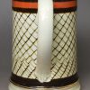 Pearlware pottery mug decorated with inlaid slip, circa 1820