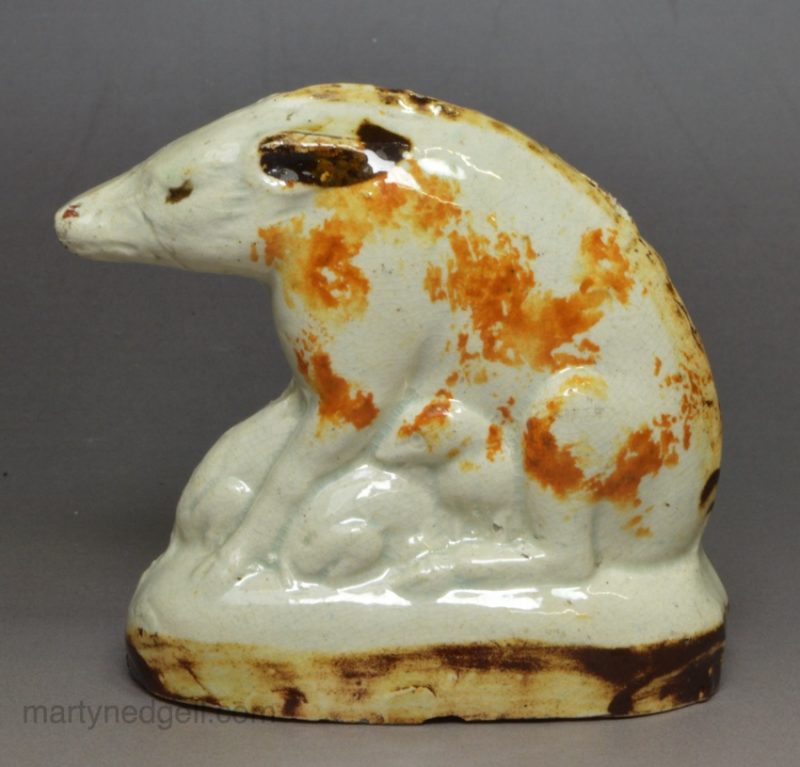 Pearlware pottery pig and piglets decorated in colours under the glaze, circa 1790