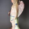 Staffordshire pearlware pottery figural candlestick decorated with overglaze enamels, circa 1820
