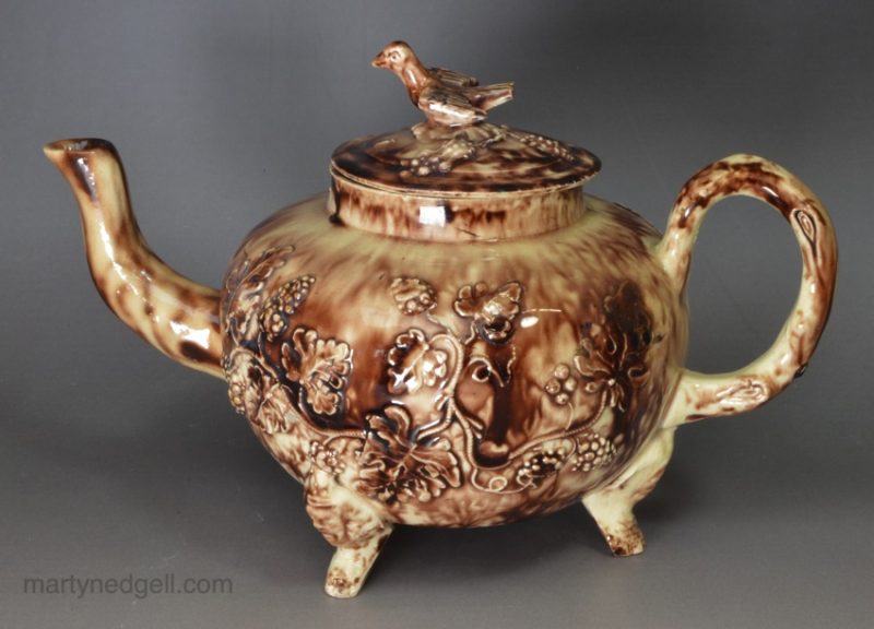 Creamware pottery teapot decorated with Whieldon type colour under the glaze, circa 1770