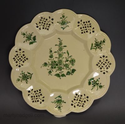 Creamware pottery. pierced plate decorated with green enamel, circa 1775