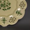 Creamware pottery. pierced plate decorated with green enamel, circa 1775