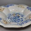 London delft buckle dish decorated with three colours, circa 1660