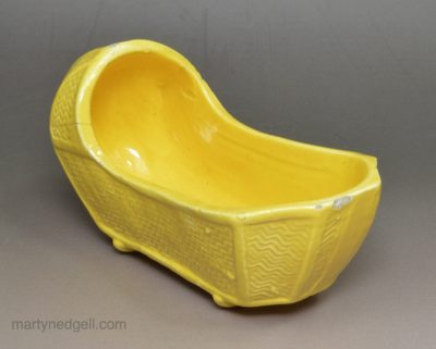 Canary yellow toy cradle, circa 1820