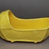 Canary yellow toy cradle, circa 1820