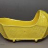 Canary yellow toy cradle, circa 1820