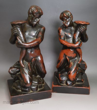 Pair of Wood & Caldwell pottery figural candlesticks Triton, circa 1810