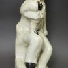 Staffordshire pottery figure of Uncle Tom, circa 1870