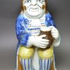 Prattware pottery Toby jug with hat, circa 1820,