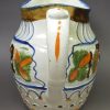 Prattware pottery jug decorated with colours under the glaze, circa 1880