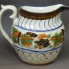 Prattware pottery jug decorated with colours under the glaze, circa 1880