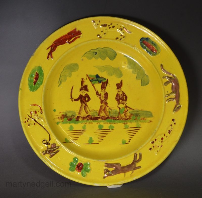 Canary Yellow child's plate 'PLAYING AT SOLDIERS', circa 1820