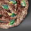 Creamware pottery plate decorated with Whieldon type colours under the glaze, circa 1770