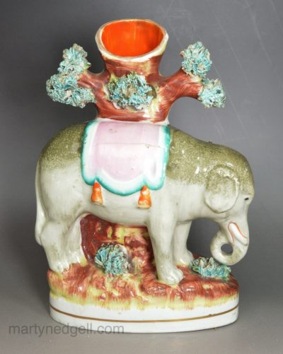 Staffordshire pottery circus elephant spill vase, circa 1860