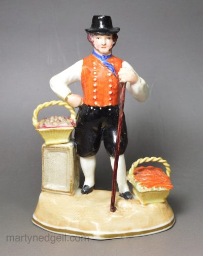 Alcock pottery figure of a man going to market, circa 1830