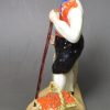 Alcock pottery figure of a man going to market, circa 1830