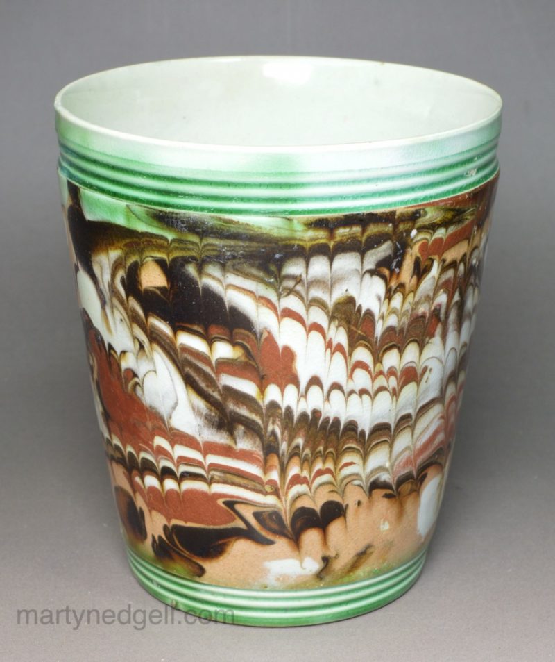 Pearlware pottery beaver decorated with combed and scroddled slip, circa 1800