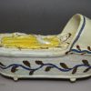 Pearlware pottery toy cradle and baby, circa 1820
