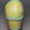 Pearlware pottery child's toy cradle and baby, circa