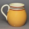 Creamware pottery mustard pot decorated with slip and inlayed slip, circa 1820