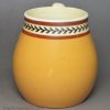Creamware pottery mustard pot decorated with slip and inlayed slip, circa 1820