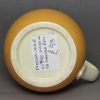 Creamware pottery mustard pot decorated with slip and inlayed slip, circa 1820
