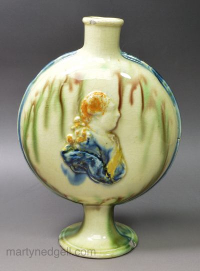 Creamware pottery flask moulded with King George III and Queen Charlotte, circa 1790