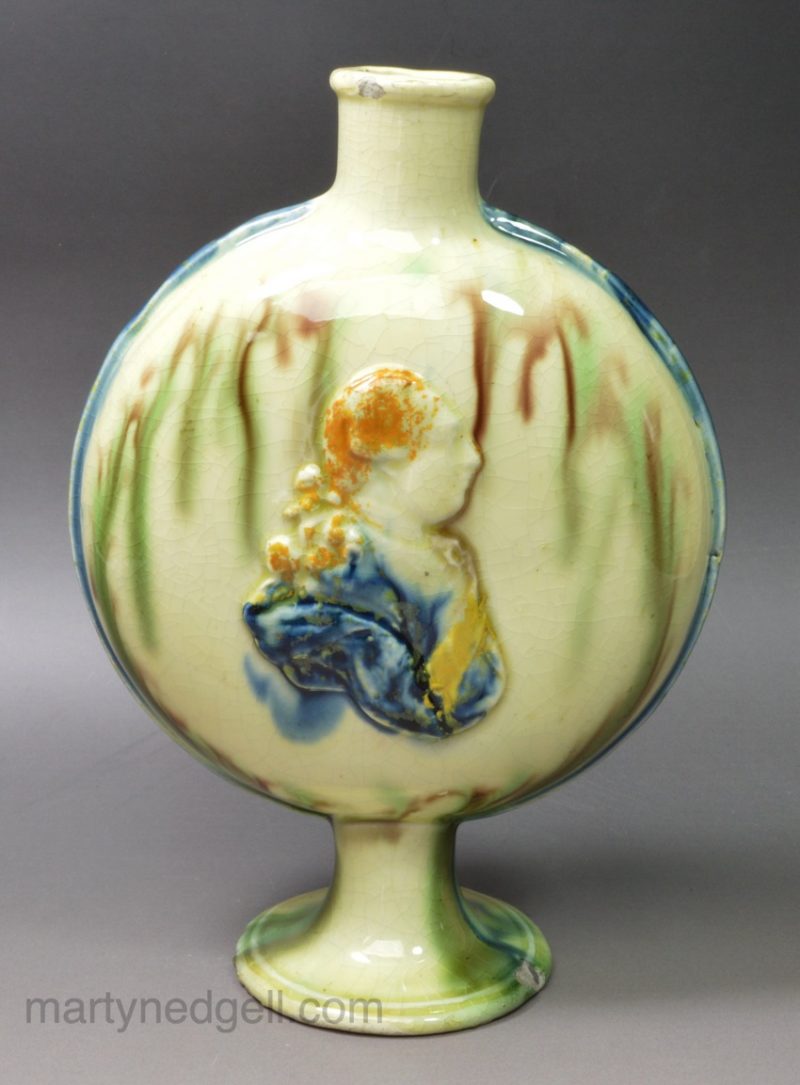 Creamware pottery flask moulded with King George III and Queen Charlotte, circa 1790