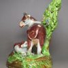 Pearlware pottery cow and calf bocage figure, circa 1820