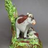 Pearlware pottery cow and calf bocage figure, circa 1820