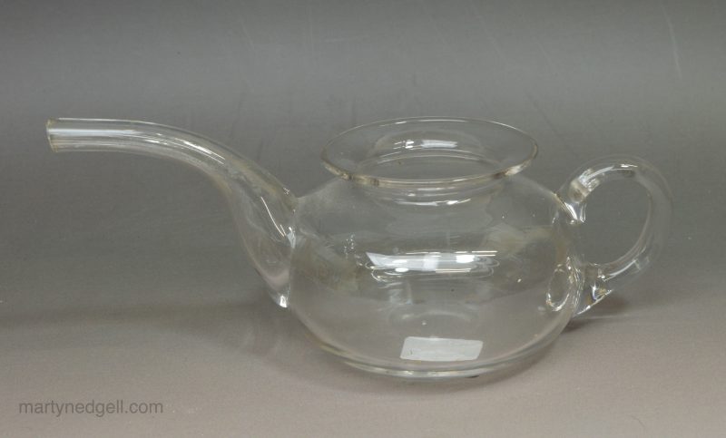 Glass invalid feeding cup, circa 1850