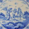 Dutch Delft biblical tile of Adam and Eve getting cast out of Eden, circa 1750
