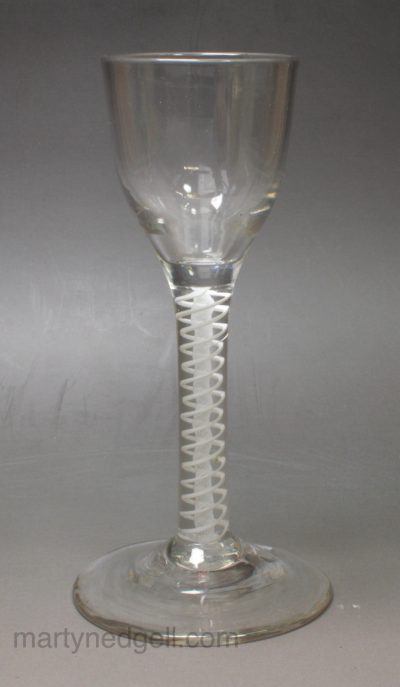 English wine glass with an opaque white spiral in the stem, circa 1770