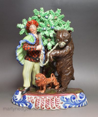Staffordshire figure of a Savoyard with his dancing bear, circa 1820