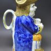Prattware pottery Toby Jug decorated with colours under a pearlware glaze, circa 1820