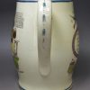 Creamware pottery jug decorated with a Napoleonic cartoon, circa 1815 JOHN BULL peppering BUONAPARTE in the FRONT and REAR