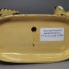 Yorkshire type buff coloured pottery cow and calf, circa 1820