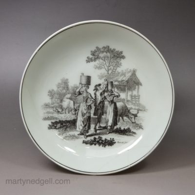 Worcester porcelain saucer decorated with a Robert Hancock print of two milkmaids, circa 1765