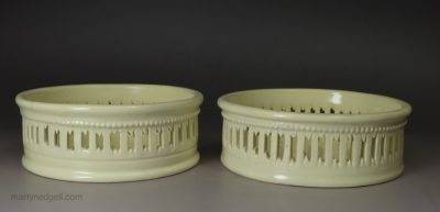 Pair of creamware pottery wine coasters, circa 1780