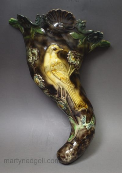 Creamware pottery wall pocket moulded with a bird and decorated with Whieldon type colours under the glaze, circa 1770