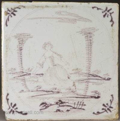 Bristol delft tile painted with a woman in manganese, circa 1750