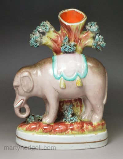 Staffordshire pottery circus elephant spill vase, circa 1860