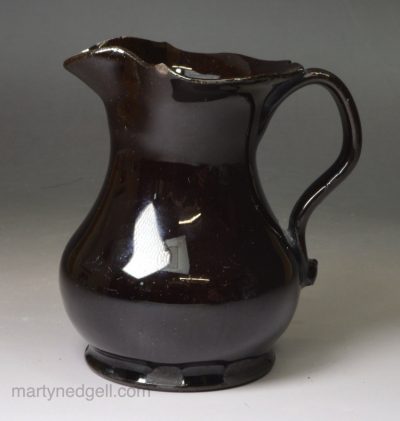 Small Jackfield black cream jug, circa 1770